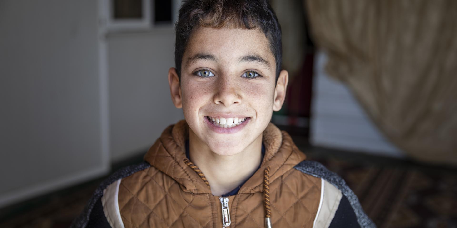 Un bambino di 11 anni, nella sua casa all’interno del campo profughi siriani di Za’atari in Giordania
